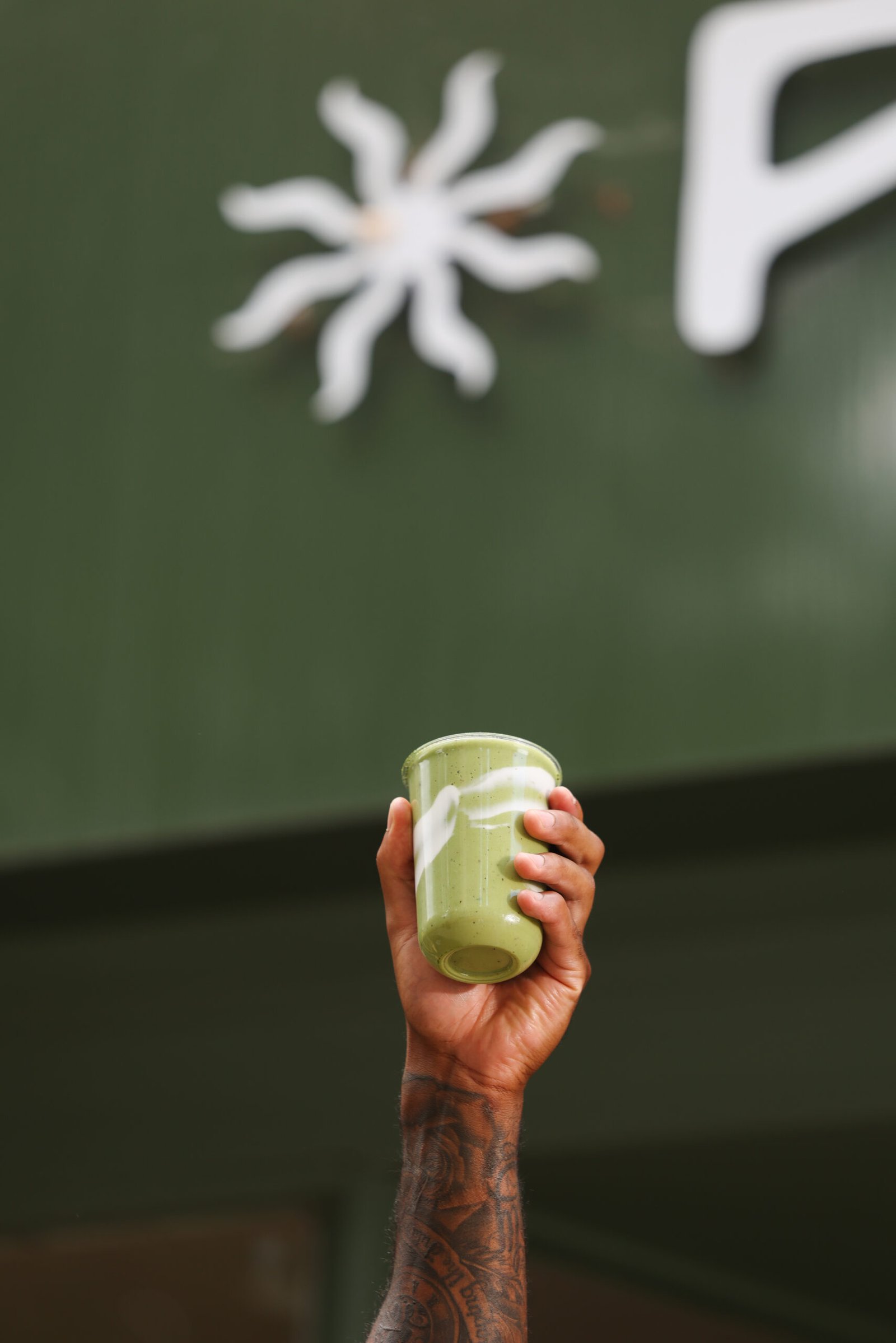 A green smoothie outside the Forma wellness bar